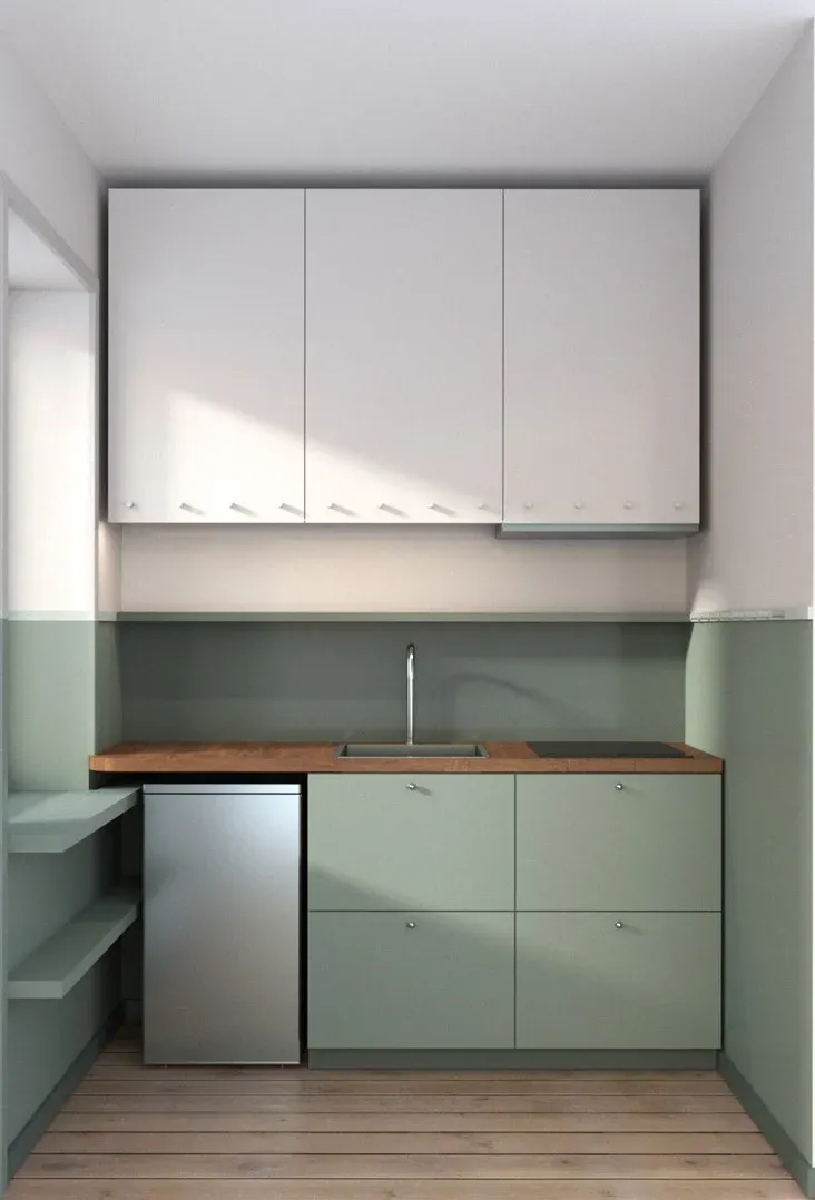 Kök i 23 kvadratmeters lägenhet med gröna köksluckor