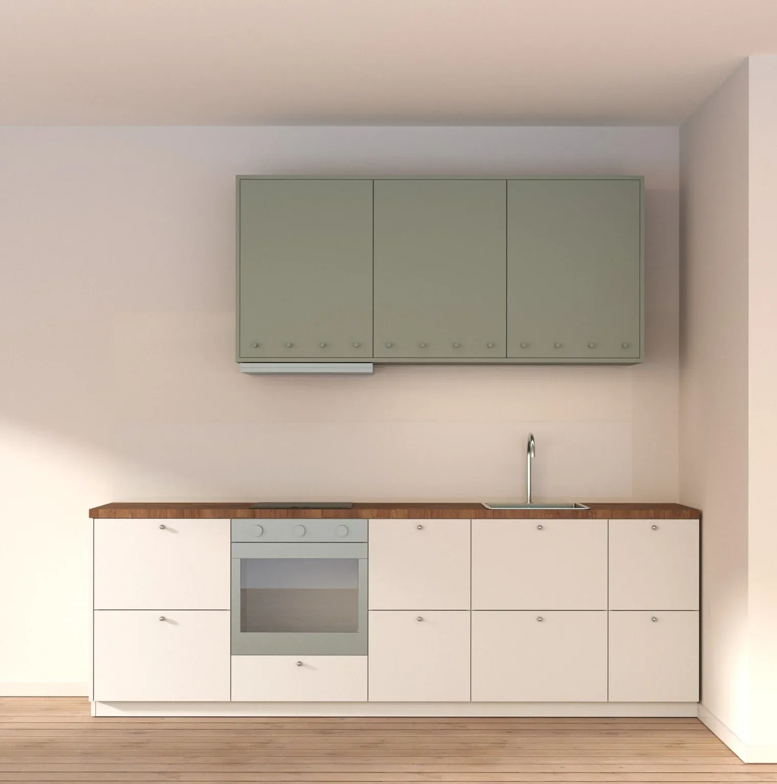 Kök i 36 kvadratmeters lägenhet med salbeiagröna överskåp och valnötsbänkskiva